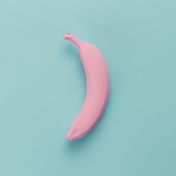 Fleksibel Dårligt humør Begrænsning Sticker Pink banana on blue pastel background. Minimal style. Flat lay. -  PIXERS.US