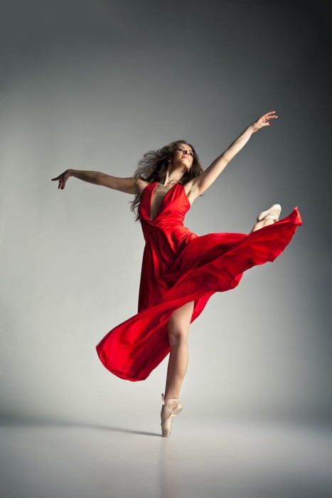 Canvas Print Ballet dancer wearing red dress over grey - PIXERS.US