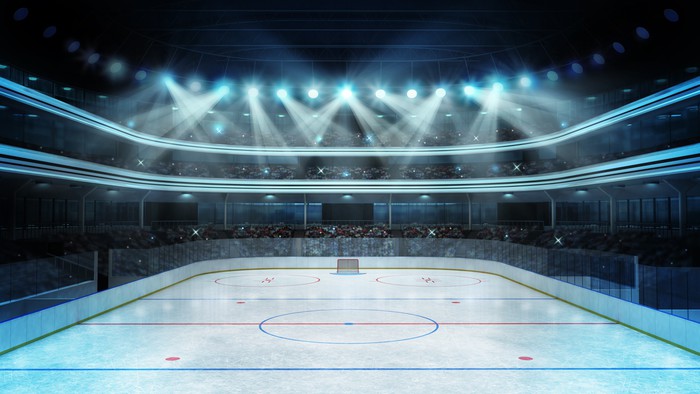 hockey stadium with spectators and an empty ice rink Wall Mural ...